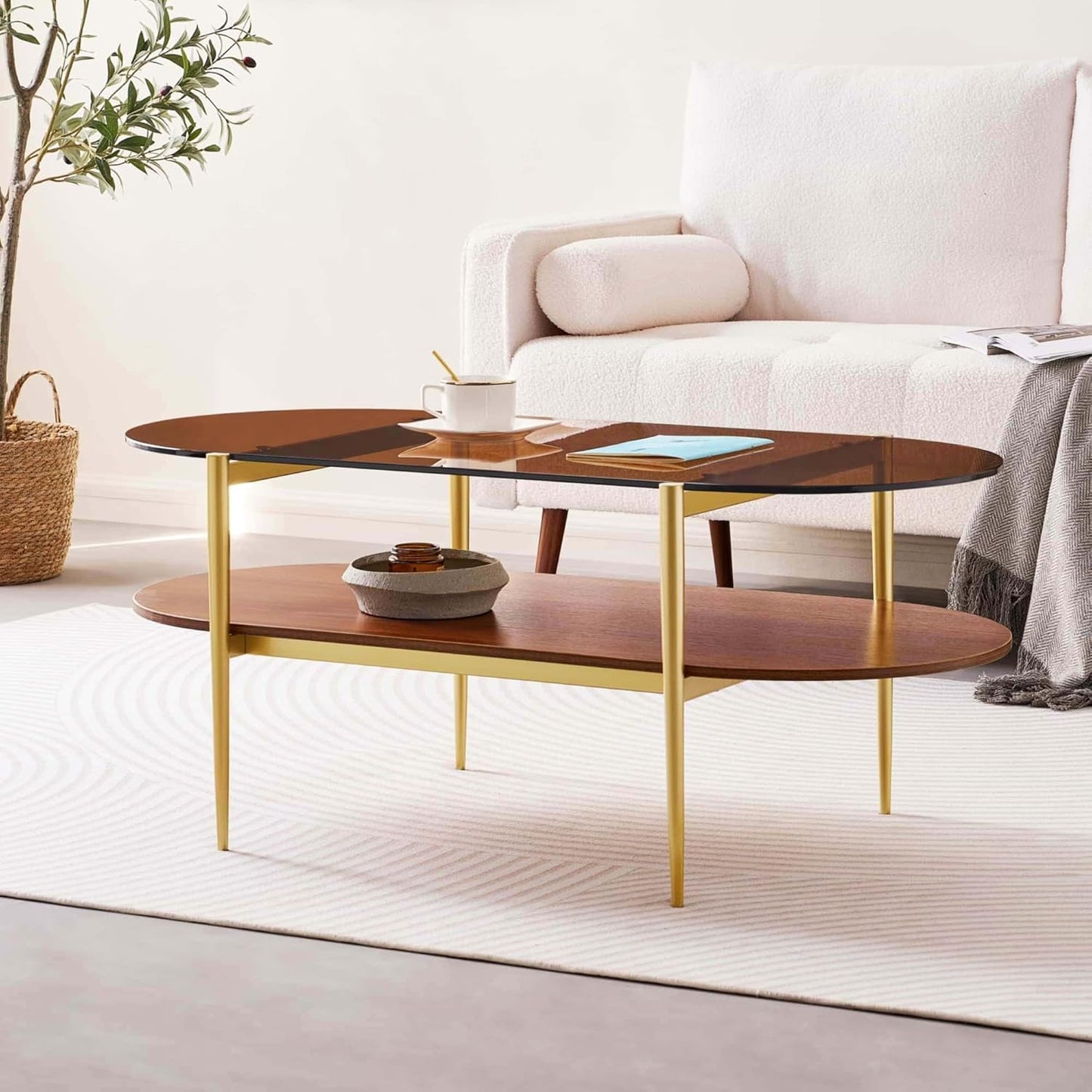 Oval Glass Coffee Table, Mid-Century Modern Design, L41 x W21 x H17 inch, for Living Room, 2-Tier Structure, Amber Glass Top and Walnut Finish Wood Shelf, Conical Legs with Gold Finish Frame